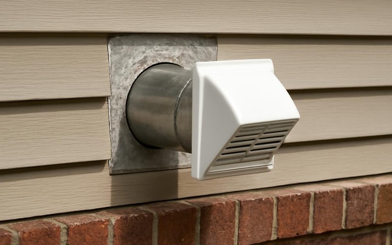 AI concept: Bathroom exhaust fan ducted through an exterior wall