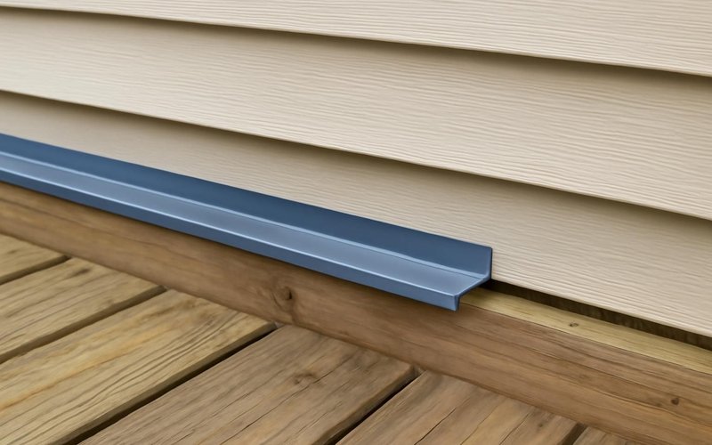 AI concept: Z-flashing installed over a deck ledger under the siding