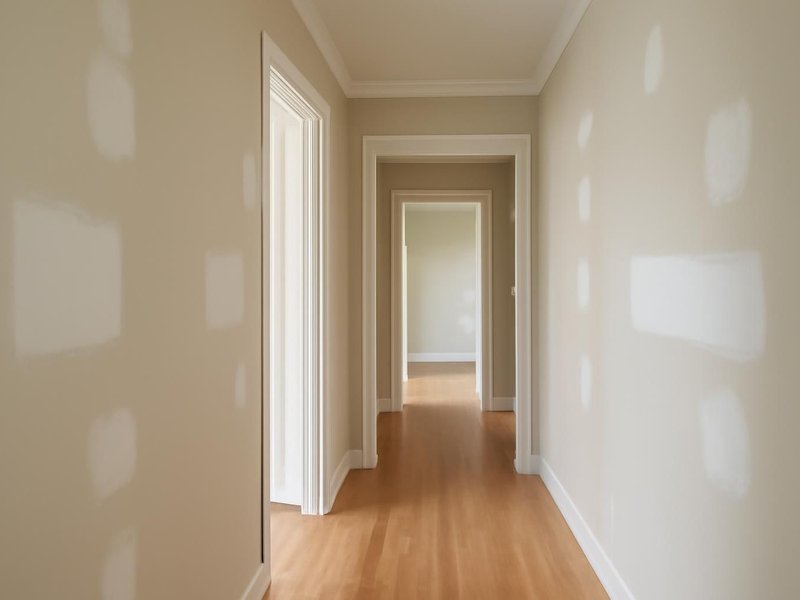 AI concept: Remodeled idea: hallway with invisible patches under fresh paint