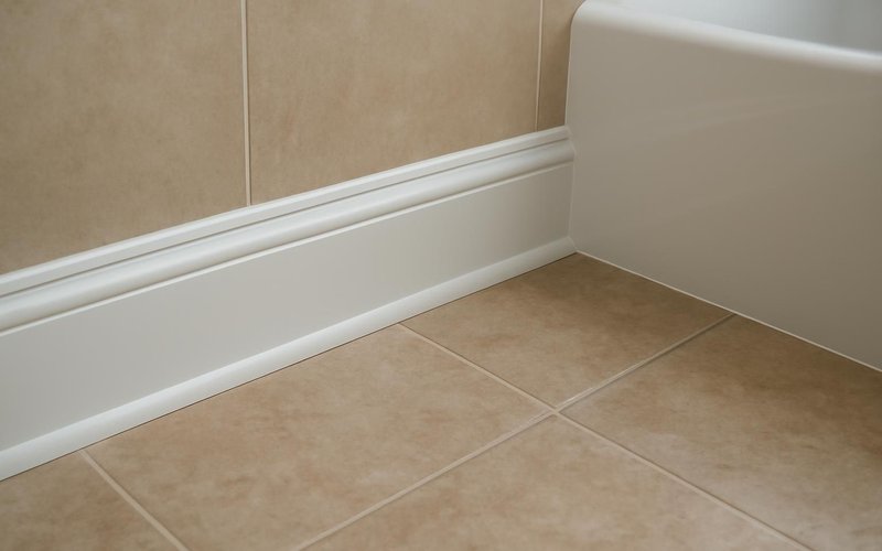 AI concept: PVC baseboard installed in a bathroom