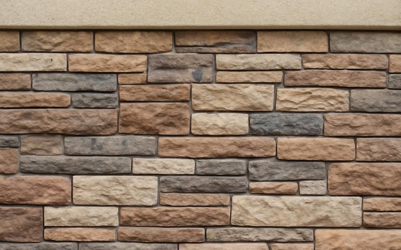 AI concept: Manufactured stone veneer on a house wall