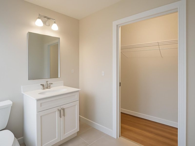 AI concept: Existing condition: small suite beside a deep reach-in closet