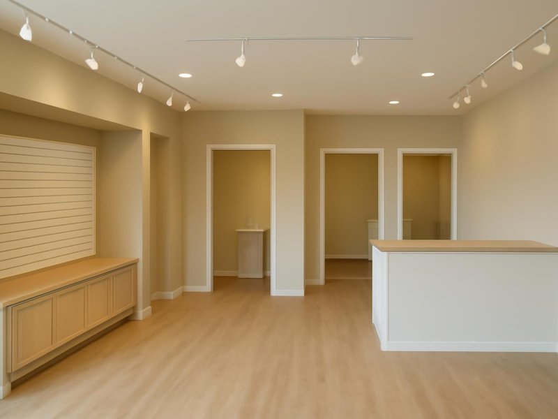 AI concept: Remodeled idea: built-out boutique with restrooms, lighting and finished floors