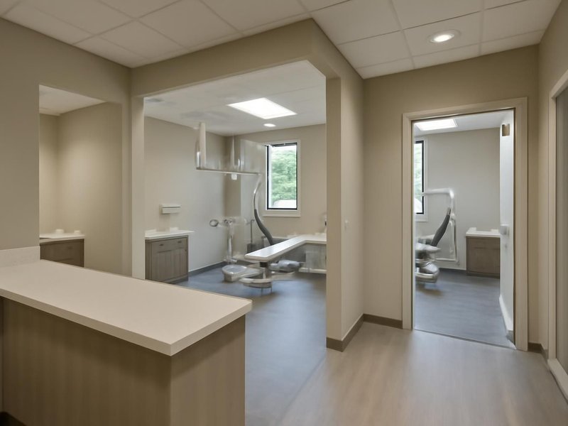 AI concept: Remodeled idea: dental suite with treatment rooms, plumbing and a reception area