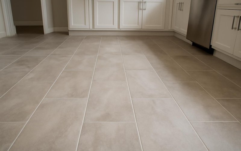 Finished porcelain tile floor in a kitchen