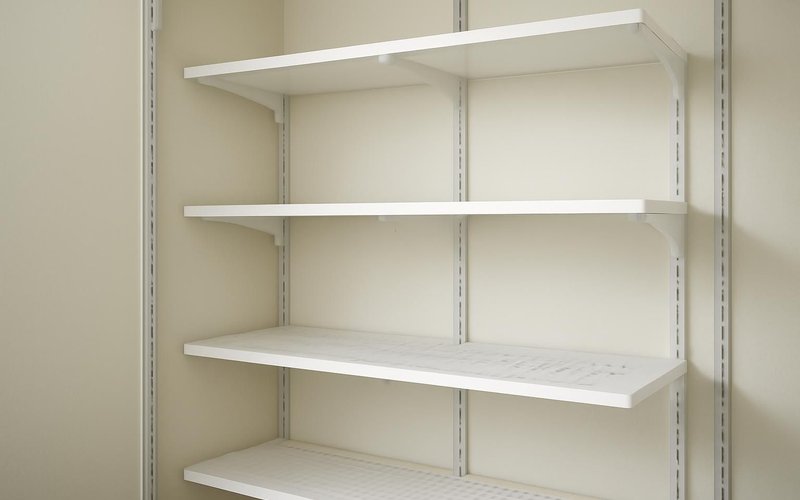 Adjustable track closet system with shelves