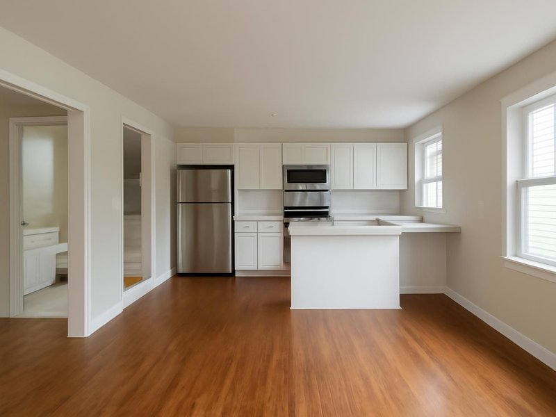 AI concept: Remodeled idea: split-level with a white kitchen, two tiled baths and oak floors